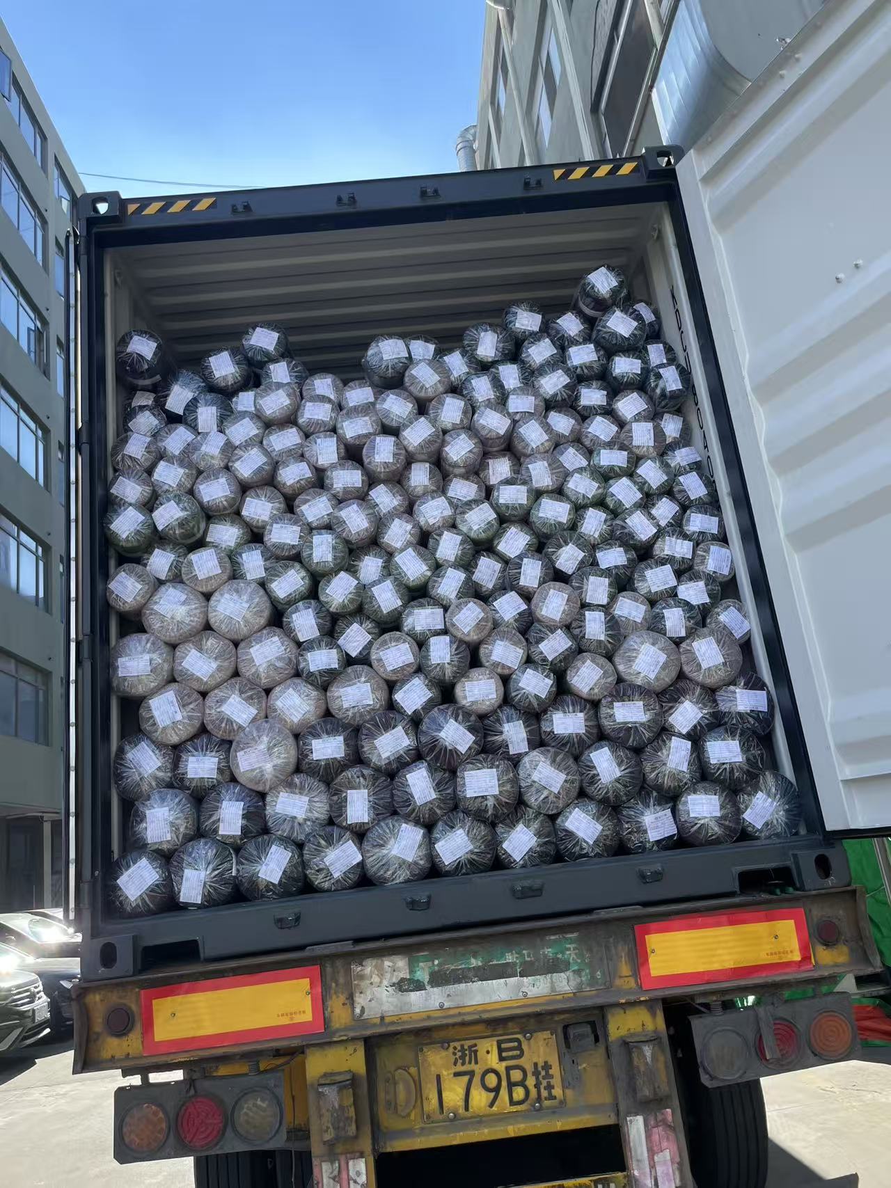 Fuxing Textile fabric rolls prepared for shipment